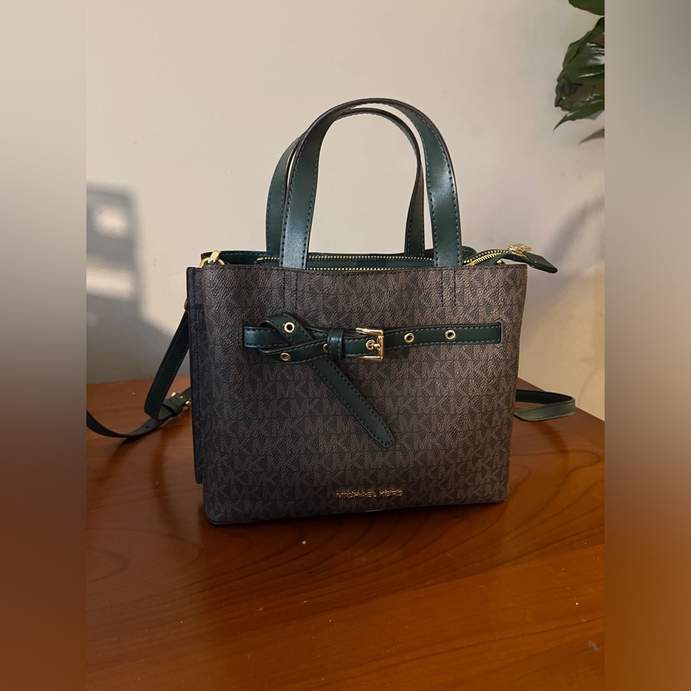 Nearly new brown signature Michael kors with green accent. MK